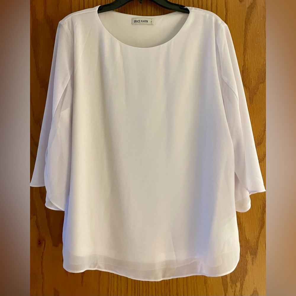 Classic white blouse with short sleeves